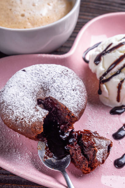 istock chocolate fondant with ice cream on wooden rustic background 1211229549