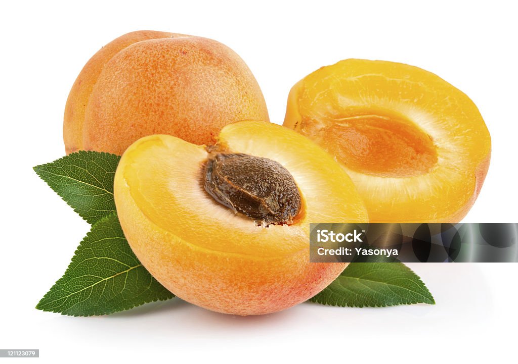 apricot fruits with green leaf apricot fruits with green leaf and cut isolated on white background Apricot Stock Photo