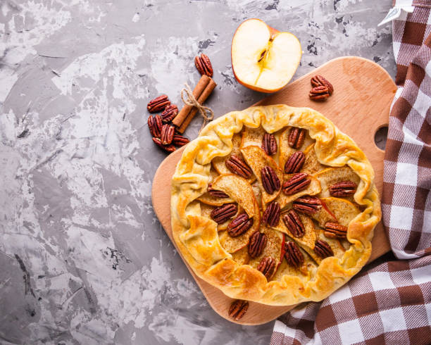 istock crispy apple galette with pecans on a rustic wooden background 1211236330