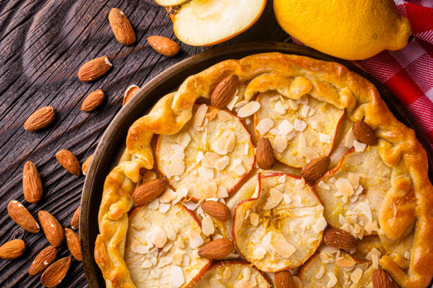 istock crispy apple galette with almonds on rustic wooden background 1211237154