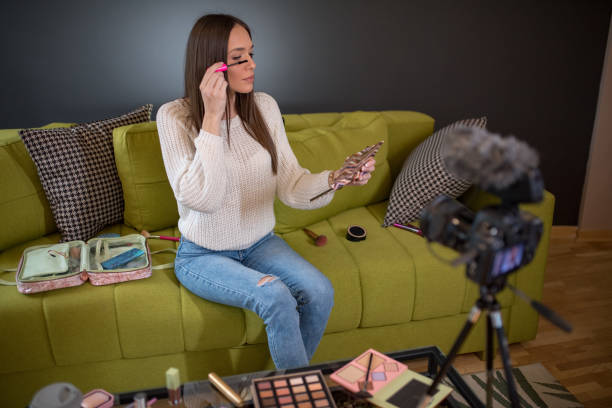 istock Woman making a video for her blog on cosmetics. 1211237220