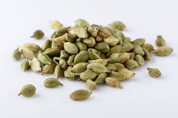 istock fragrant green cardamom on a white acrylic background 1211237777