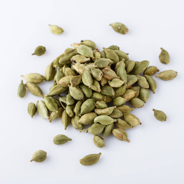 istock fragrant green cardamom on a white acrylic background 1211237788