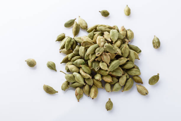 istock fragrant green cardamom on a white acrylic background 1211237799
