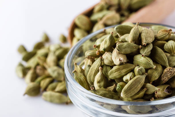 istock fragrant green cardamom on a white acrylic background 1211237853