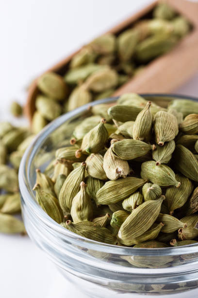 istock fragrant green cardamom on a white acrylic background 1211237937