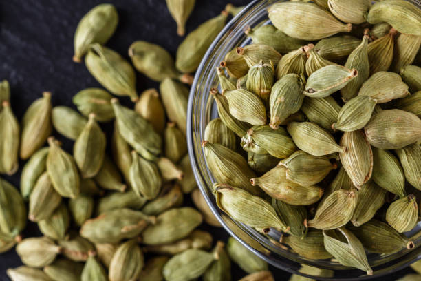 istock fragrant green cardamom on a dark stone background 1211238872