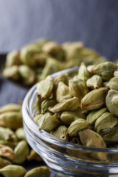 istock fragrant green cardamom on a dark stone background 1211238917