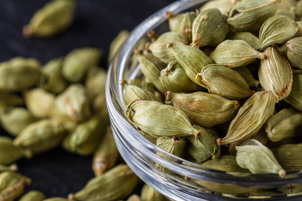istock fragrant green cardamom on a dark stone background 1211238932
