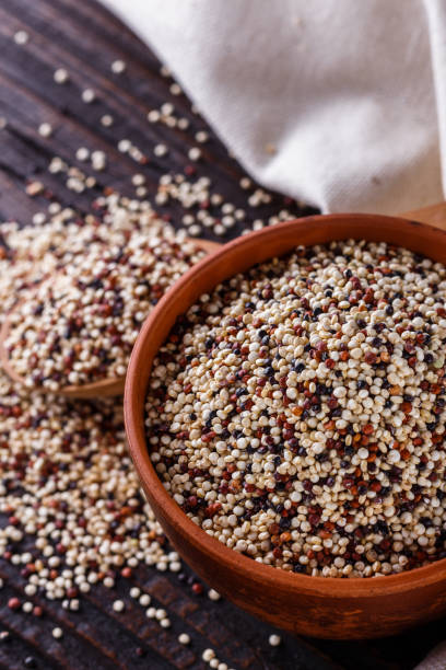 istock mix of quinoa grains on dark wooden rustic background 1211242284