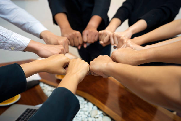 istock Young group are join hands for working the job success , Hands, symbolizing the hands to unity and line connection for teamwork ,success , concept. 1211242854