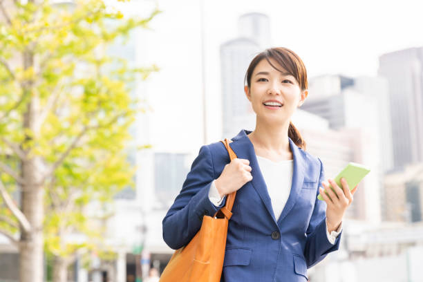 istock asian woman who see a smart phone 1211248164