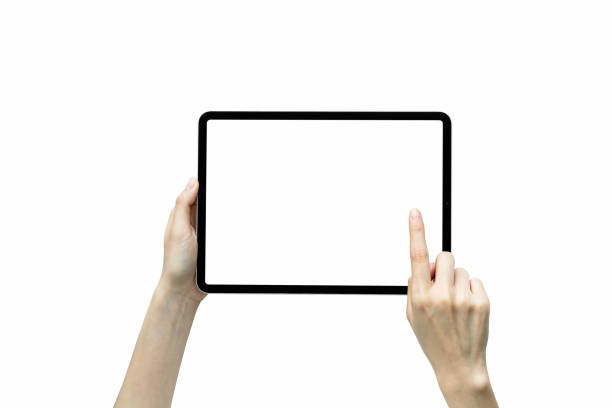 istock Close-up of hand holding black tablet isolated on white background. 1211248286