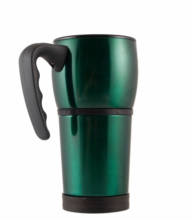 A green travel coffee/hot drink insulated green mug... with clipping path.
