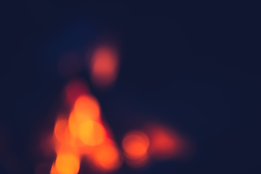 out of focus fire lights in the dark