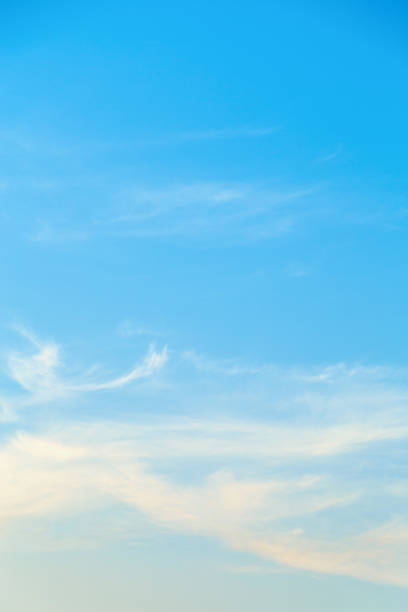 istock Vertical image pure white clouds like cotton wool in blue sky 1211252649