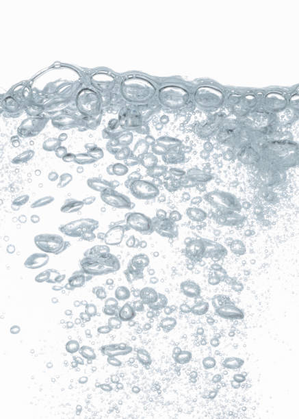 istock Close up water bubbles underwater on white background. 1211255752
