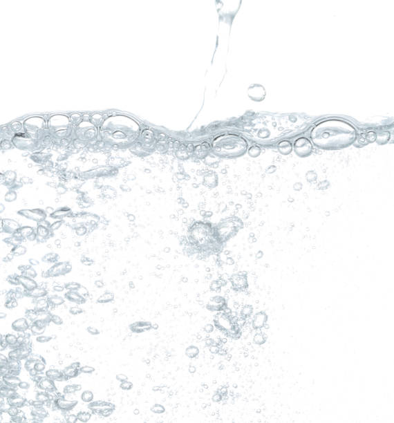 istock Close up white color water bubbles underwater on white background. 1211255785