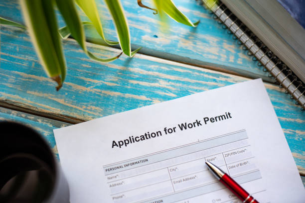 Foreign worker applying for work permit Illustrative picture of work permit application form embassy photos stock pictures, royalty-free photos & images