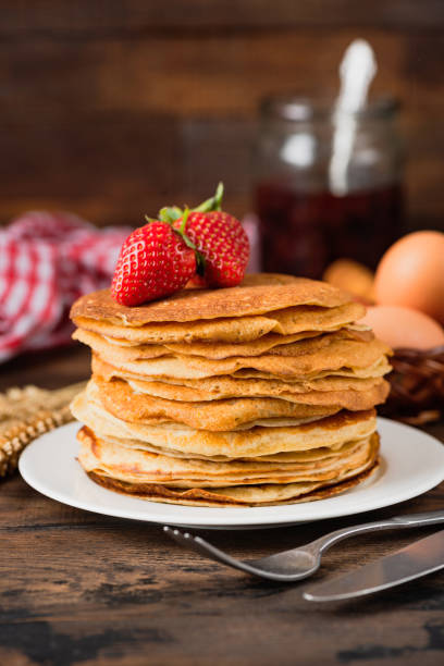 istock Russian Blini or Crepes or Thin Pancakes 1211258587