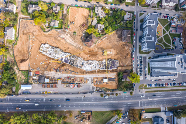 istock new apartment building under construction. drone point view 1211261187