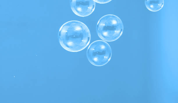 istock Soap or shampoo bubbles floating in the air by wind blow which represent refreshing and relaxing or joyful mood and tone and shoot in clear background in studio lighting set. 1211264507