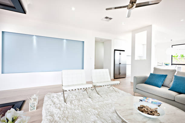 istock Modern living room and sofa beside a kitchen 1211264564