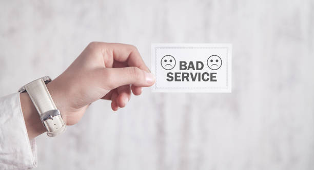 istock Hand showing Bad Service in business card. 1211269532