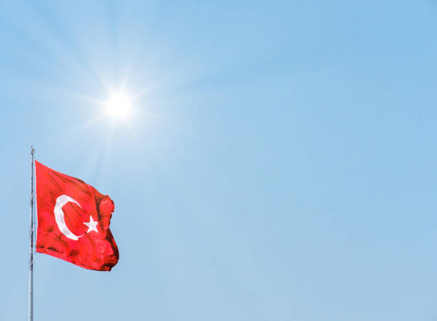 istock Turkish flag waving front of sun. 1211270304