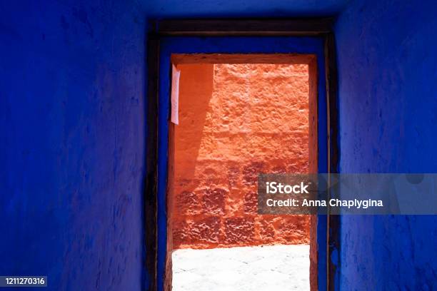 Blue Indigo Doorway Overlooking The Red Wall Stock Photo - Download Image Now - Architecture, Archival, Arequipa Province