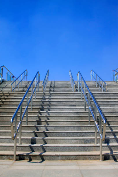 istock Stainless steel handrails and steps in a building 1211270801