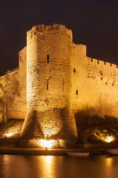 Night view of the Kyrenia Castle in Northern Cyprus. The 16th-century castle was built by the Venetians over a previous Crusader fortification. KYRENIA, CYPRUS - NOVEMBER 11, 2013: Night view of the Kyrenia Castle in Northern Cyprus. The 16th-century castle was built by the Venetians over a previous Crusader fortification. kyrenia photos stock pictures, royalty-free photos & images