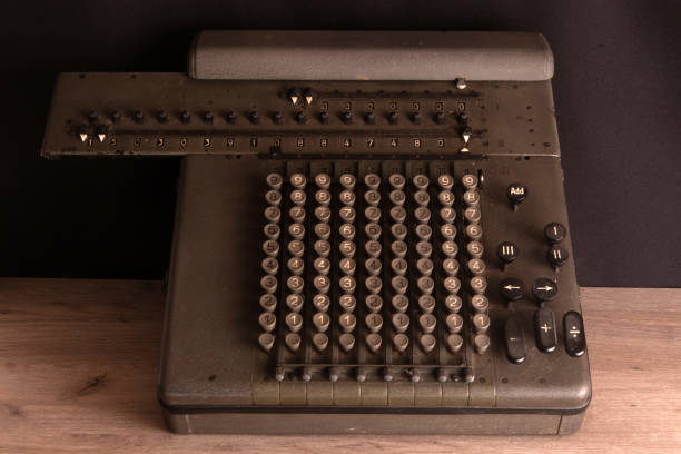 istock Old counting mechanism, dusty vintage arithmometer 1211273254