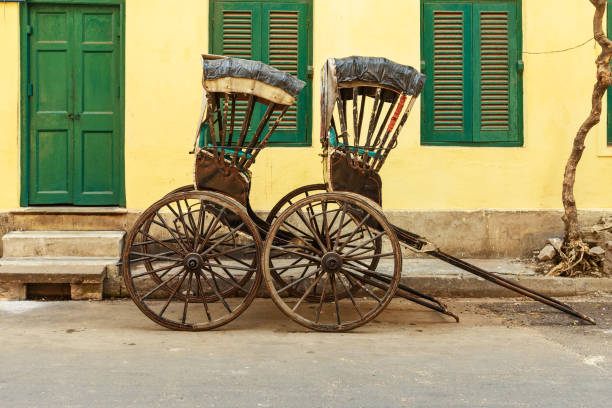istock Hand pulled rickshaws are parkedon the street. Kolkata. India 1211274239