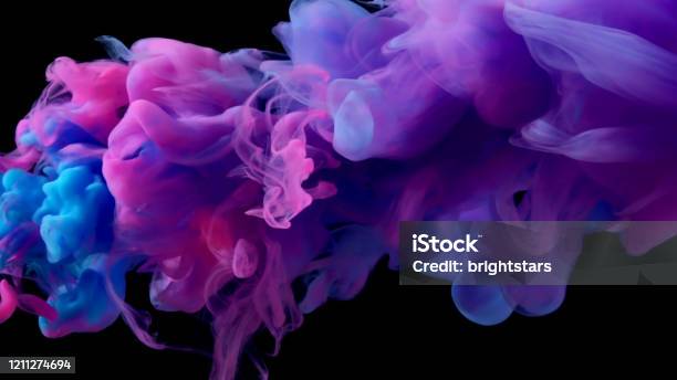 Pink And Blue Liquid Levitation Stock Photo - Download Image Now - Smoke - Physical Structure, Multi Colored, Ink