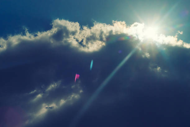 istock The sun shines bright in summer. Blue sky and clouds. 1211274742