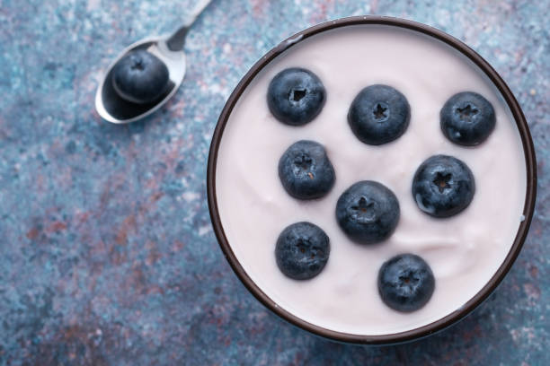 istock top view of blue berry yogurt in a bowl on table 1211277393