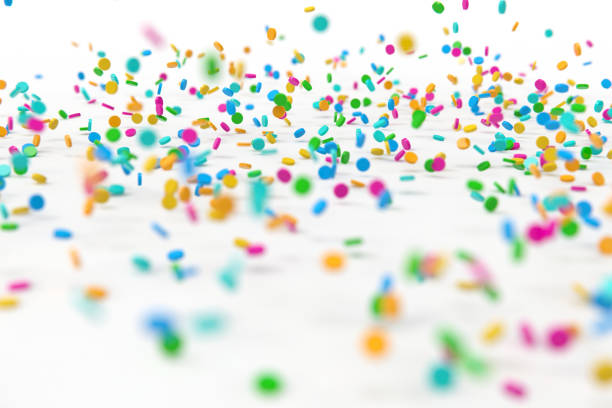 istock 3d rendering sprinkles white background stock photo 1211278541