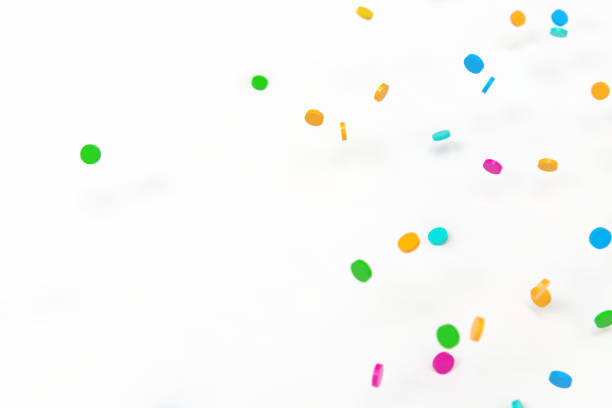 istock 3d rendering sprinkles white background stock photo 1211278548