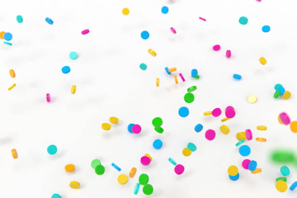 istock 3d rendering sprinkles white background stock photo 1211278549