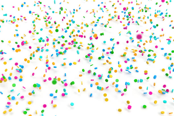 istock 3d rendering sprinkles white background stock photo 1211278552