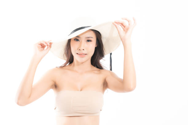 istock Woman studio portrait with sunlight. 1211279652