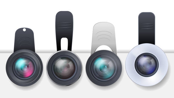 Vector set of clip-on lenses for mobile devices Vector realistic set of clip-on lenses for mobile devices, smartphones and tablets isolated on white background. Modern portable gadget, mini objective to attach on cell phone photo camera metal clip stock illustrations