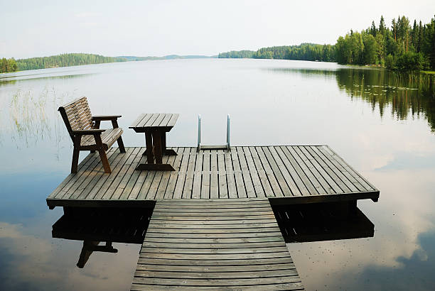 istock Lake with small wooden platform for rest 121128130