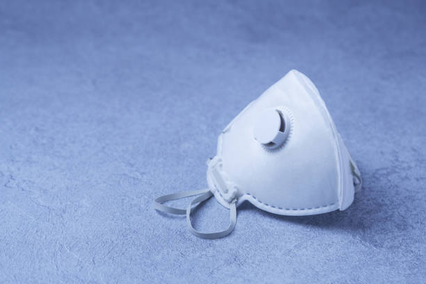 White ffp3 face mask with a valve