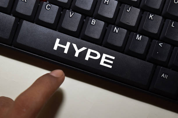 istock Hype write on keyboard isolated on laptop background 1211291697