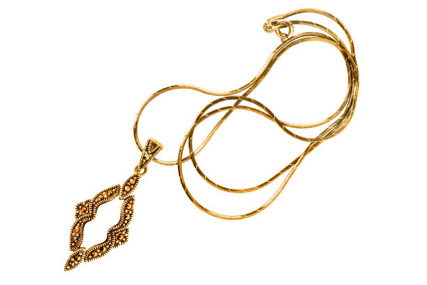 istock Gold necklace isolated 1211292942