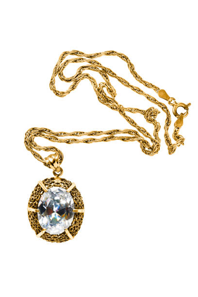 istock Gold necklace isolated 1211293472