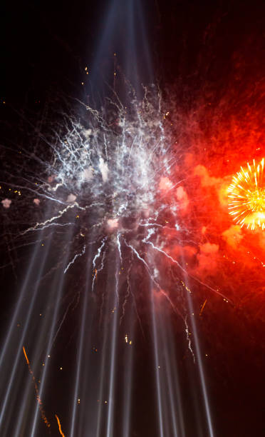 istock Colorful fireworks on the black sky background. 1211293475