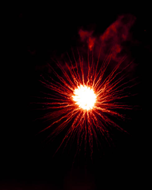 istock Colorful fireworks on the black sky background. 1211293638